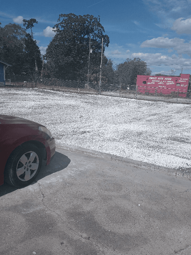 Space in paved lot on Main St